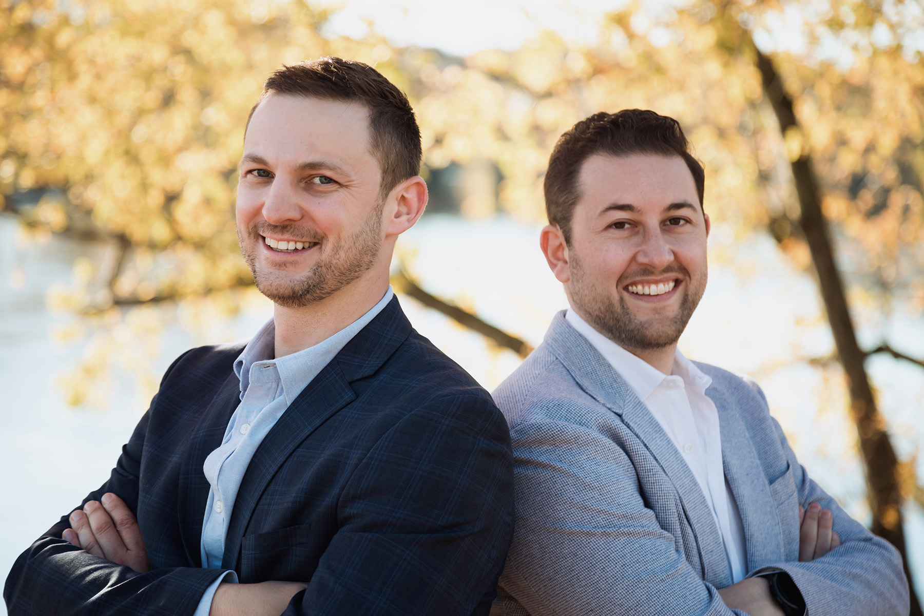 Two men smiling outdoors